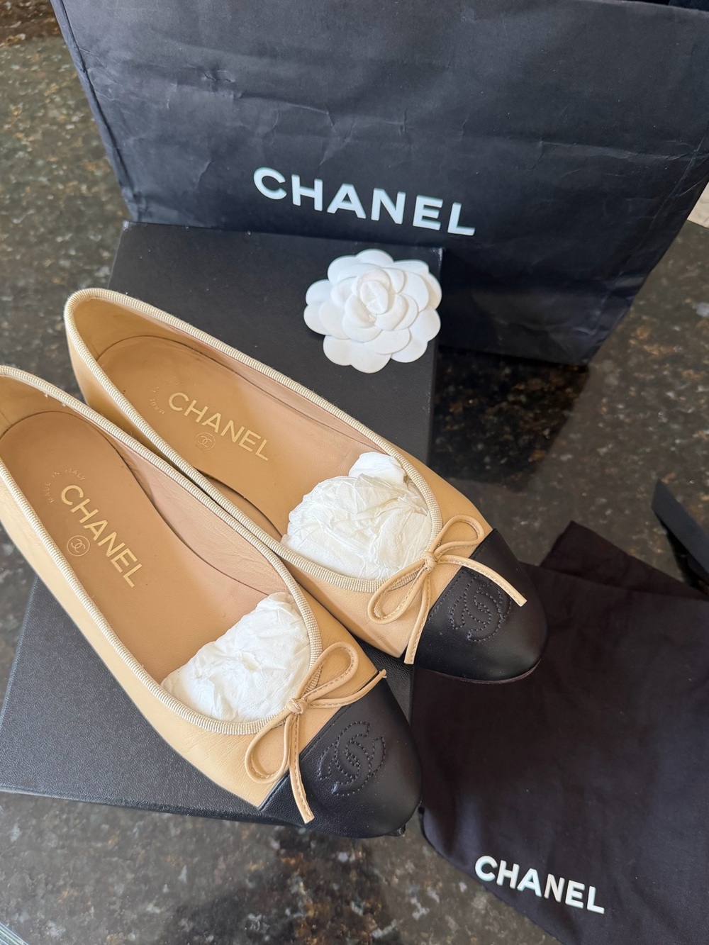 CHANEL Two-Tone Tan and Black Leather Cap-Toe Ballet Flats